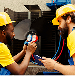 two man is trying diagnosis the problem of AC
